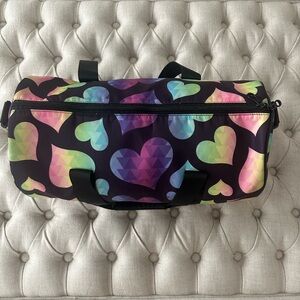 Rainbow heart duffle bag in excellent condition. One zippered inside pocket.
